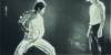 Bruce Lee Lighting Matches With Nunchucks